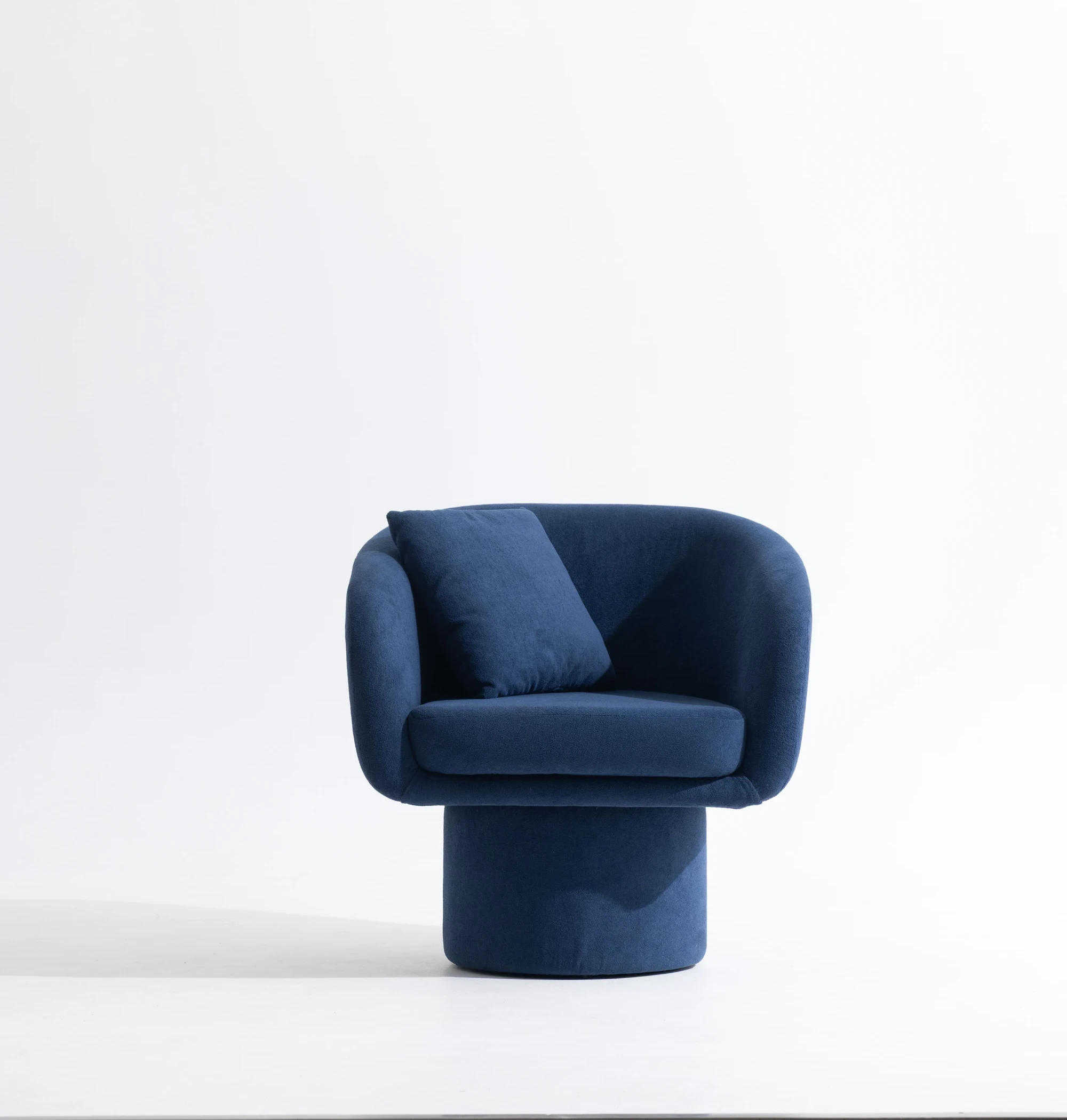 Nest Chair in suede fabric with swivel base